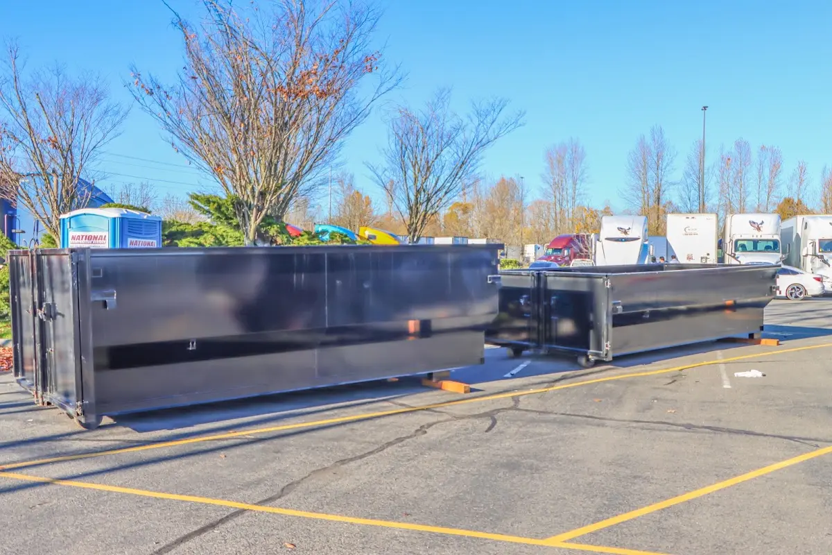 Professional dumpster rental service with roll-off container on residential driveway in Tamalpais-Homestead Valley